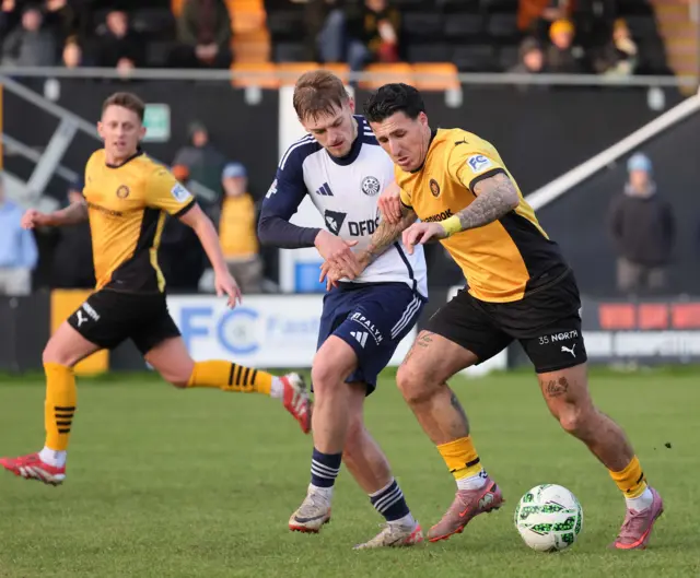 Danny Gibson dribbling