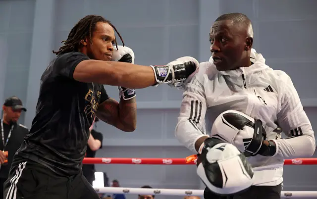 Anthony Yarde on pads with Tunde Ajayi