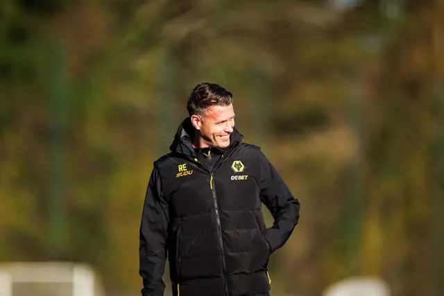 Rob Edwards smiling at Wolves training