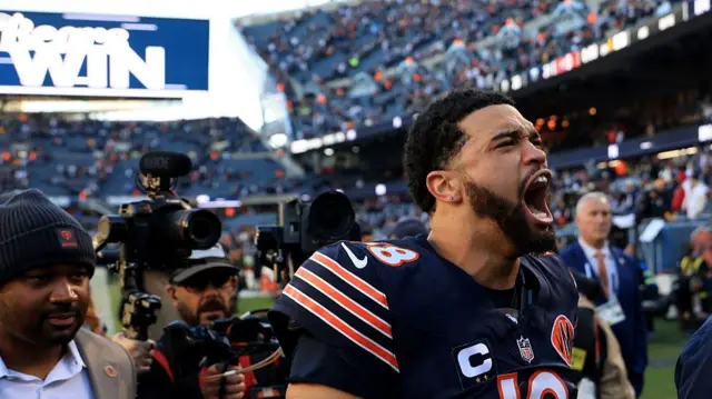 Caleb Williams celebrates after the Chicago Bears beat the Pittsburgh Steelers