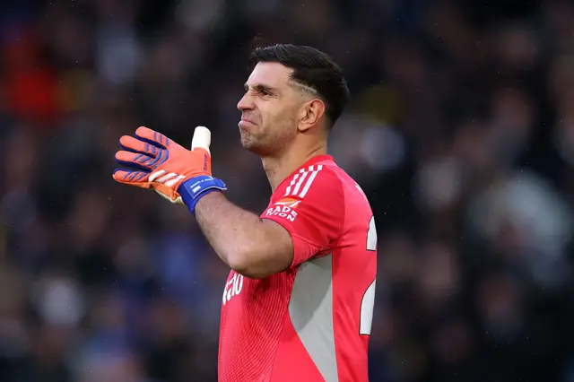 Emiliano Martinez of Aston Villa reacts after conceding a goal during the Premier League match between Leeds United and Aston Villa at Elland Road on November 23, 2025 in Leeds, England.
