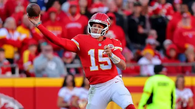 Patrick Mahomes throws a pass