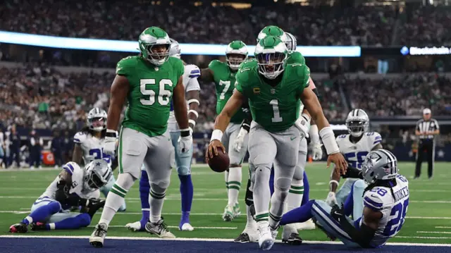 Jalen Hurts celebrates after scoring a touchdown for the Eagles