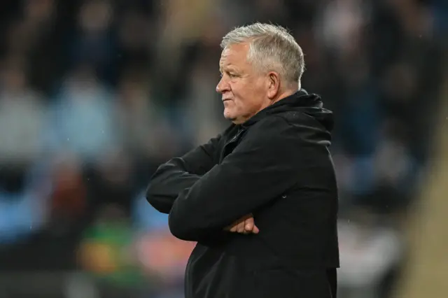 Chris Wilder with his arms folded watching Sheff Utd lost at Coventry