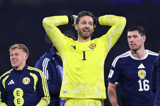 Craig Gordon celebrates with his Scotland team-mates