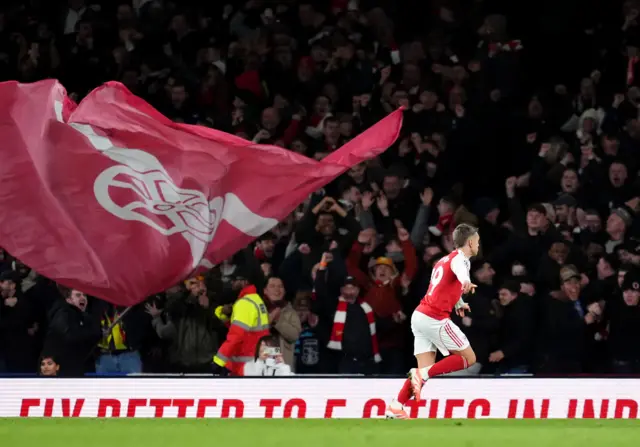 Arsenal's Leandro Trossard celebrates scoring their side's first goal of the game during the Premier League match at the Emirates Stadium, London.