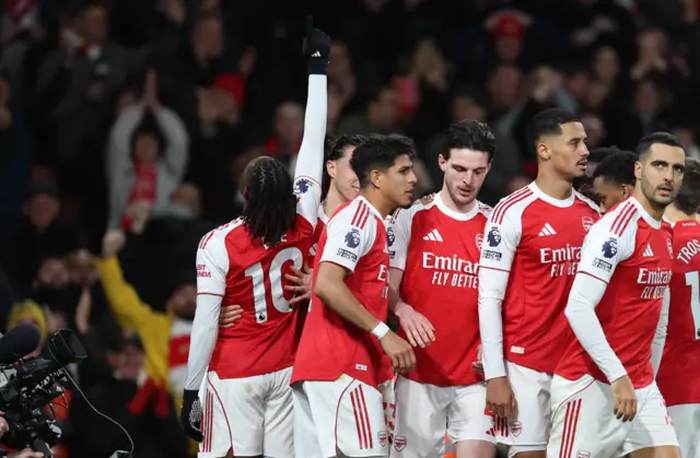 Arsenal's Eberechi Eze celebrates scoring their third goal with teammates