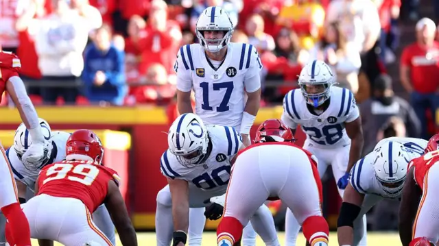 Daniel Jones lines up and readies himself to receive the ball behind his O Line