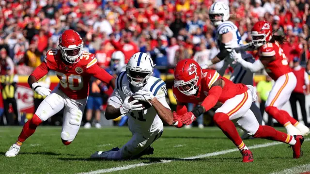 Michael Pittman Jr dives into the endzone and for the score against the Kansas City Chiefs