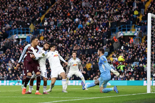 Morgan Rogers of Aston Villa scores his team's first goal during the Premier League match between Leeds United and Aston Villa at Elland Road on November 23, 2025 in Leeds, England.