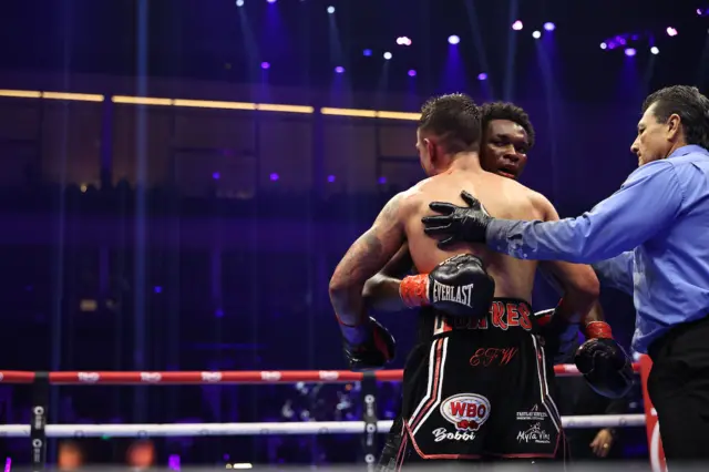 Mason and Noakes embrace