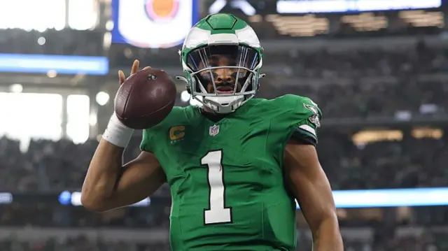 Jalen Hurts celebrates after scoring a touchdown against the Cowboys.