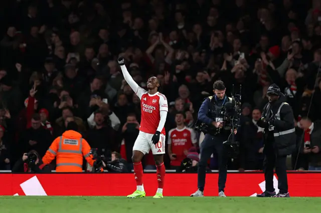 Eberechi Eze of Arsenal celebrates scoring his team's fourth goal during the Premier League match between Arsenal and Tottenham Hotspur at Emirates Stadium on November 23, 2025 in London, England.