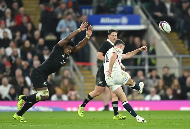 George Ford kicks the bal