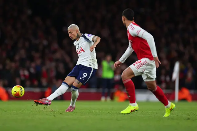 Richarlison of Tottenham Hotspur scores a goal to make it 3-1 during the Premier League match between Arsenal and Tottenham Hotspur at Emirates Stadium on November 23, 2025 in London, England.