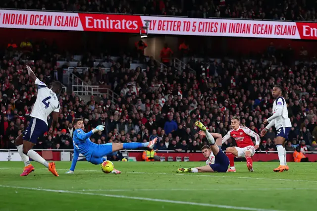 Leandro Trossard of Arsenal scores the first goal during the Premier League match between Arsenal and Tottenham Hotspur at Emirates Stadium on November 23, 2025 in London, England.