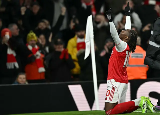 Arsenal's English midfielder #10 Eberechi Eze (L) celebrates scoring his team's third goal during the English Premier League football match between Arsenal and Tottenham Hotspur at the Emirates Stadium in London on November 23, 2025.