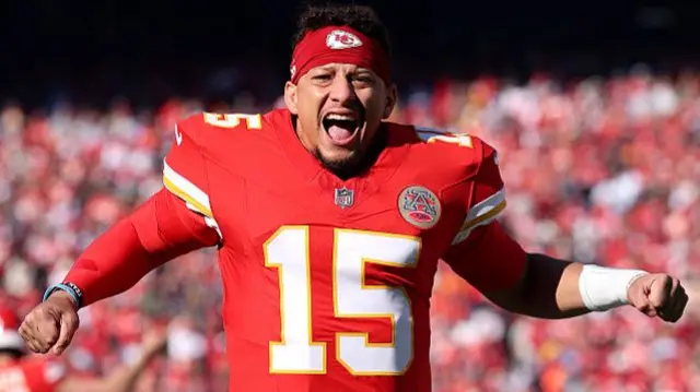 Patrick Mahomes shouts on the field before the Kansas City Chiefs play against the Indianapolis Colts