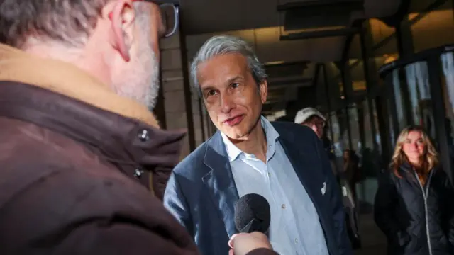 Former BBC adviser Michael Prescott speaks to a reporter outside Portcullis House on 24 November