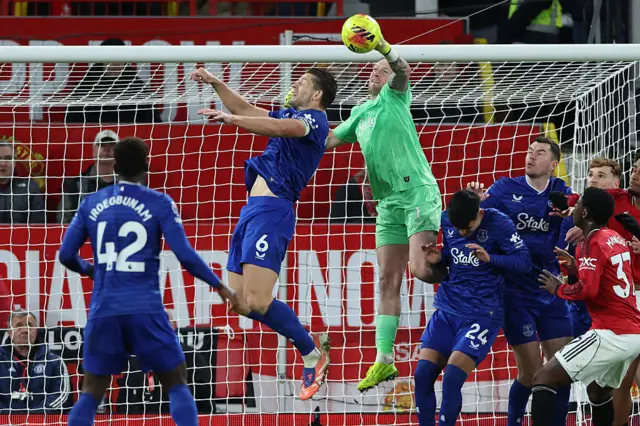Jordan Pickford punches the ball clear