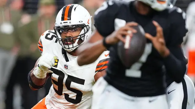 Cleveland Browns defensive end Myles Garrett runs after Las Vegas Raiders quarterback Geno Smith