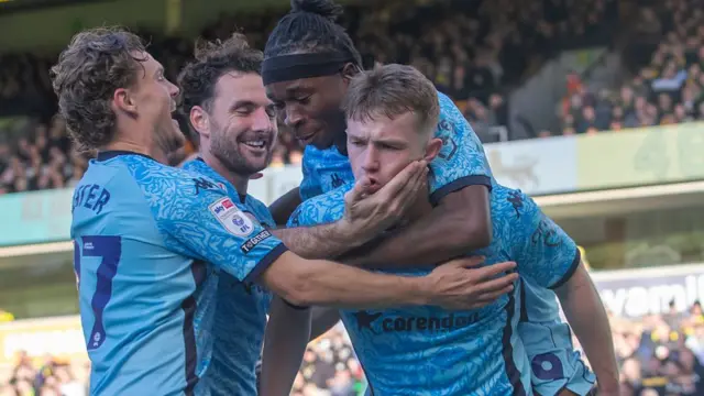 Hull players celebrate with Joel Gelhardt