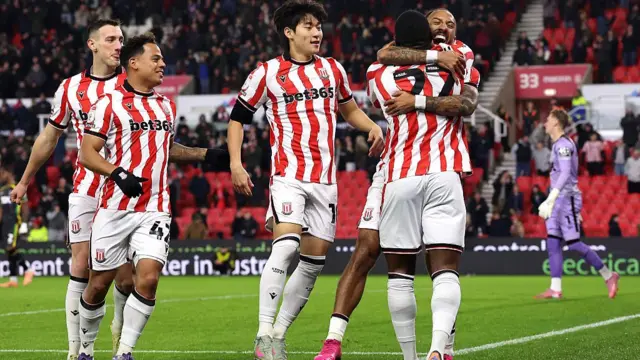 Sorba Thomas celebrates with his Stoke team-mates