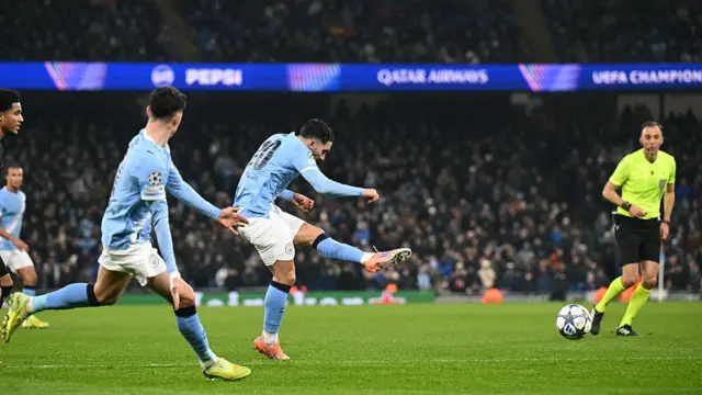 Rayan Cherki shoots but fails to score