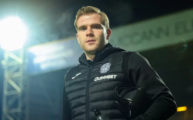 Hibs wing-back Chris Cadden arriving at Fir Park