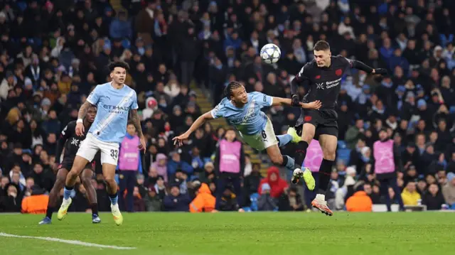 Patrik Schick of Bayer Leverkusen scores