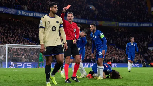 Ronald Araujo of Barcelona is shown a red card