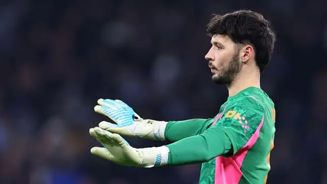 ames Trafford of Manchester City tells his team-mates to slow down