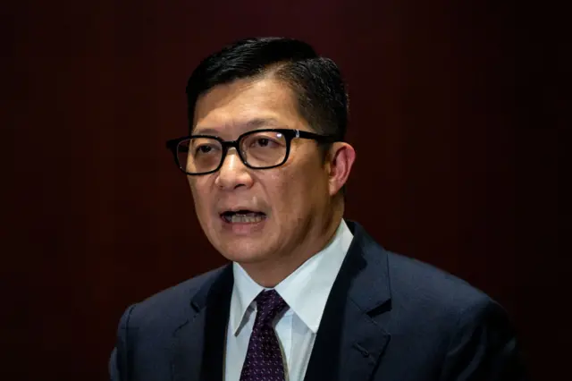 Hong Kong Secretary for Security, Tang Ping-keung, is speaking at a press briefing in 2024