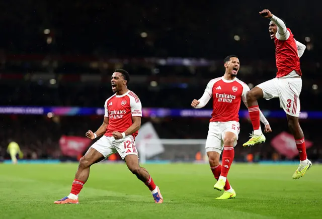 urrien Timber of Arsenal celebrates scoring