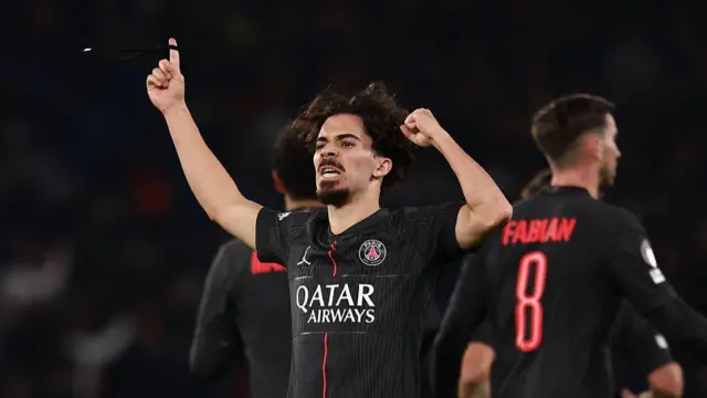 Vitinha (C) celebrates after scoring