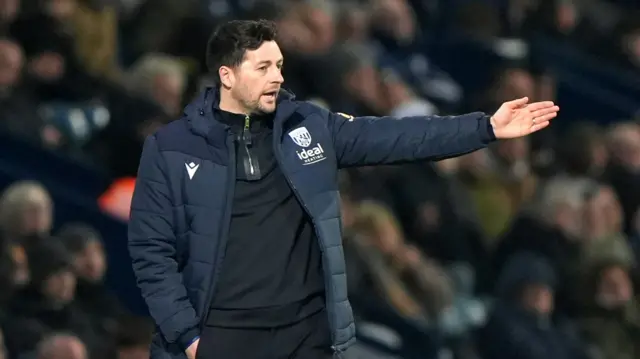 Ryan Mason gesticulates