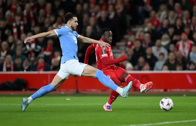 Arnaud Kalimuendo of Nottingham Forest shoots