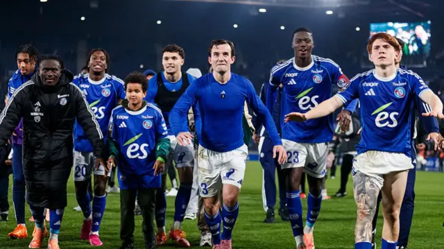 Strasbourg players celebrate after beating Lille earlier this month