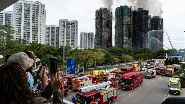 People are concerned about the situation at the scene after a fire broke out at the Wang Fuk Court housing complex in Tai Po on 27 November 2025 in Hong Kong.