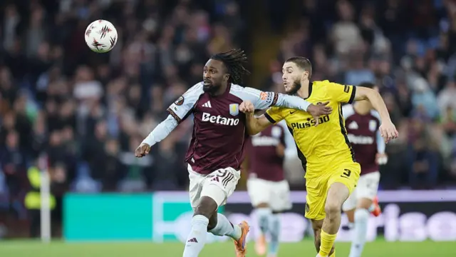 Evann Guessand of Aston Villa is challenged by Jaouen Hadjam of Young Boys