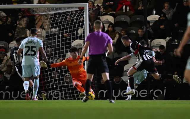 Kristian Dennis of Tranmere Rovers scores