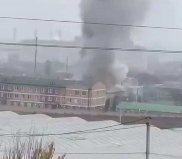 Smoking rising from a military barracks