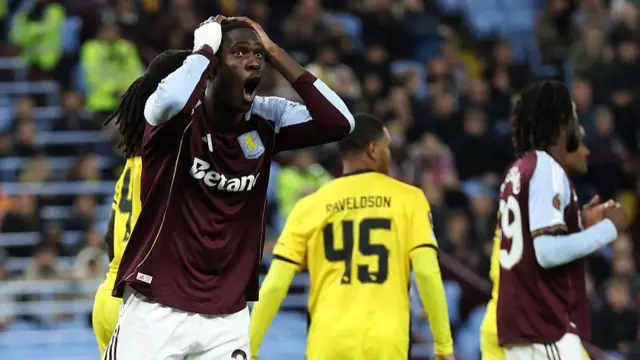 Amadou Onana reacts at a missed opportunity