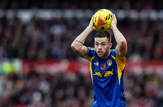 Leeds United's Gabriel Gudmundsson takes a throw in