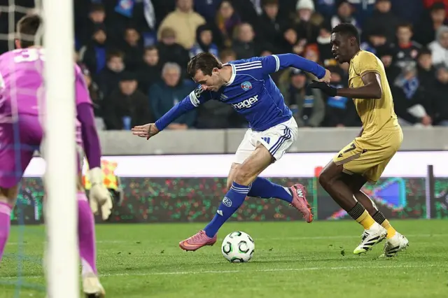 Ben Chilwell controls the ball under pressure