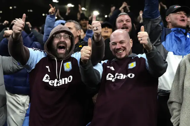 Villa fans celebrate at full time