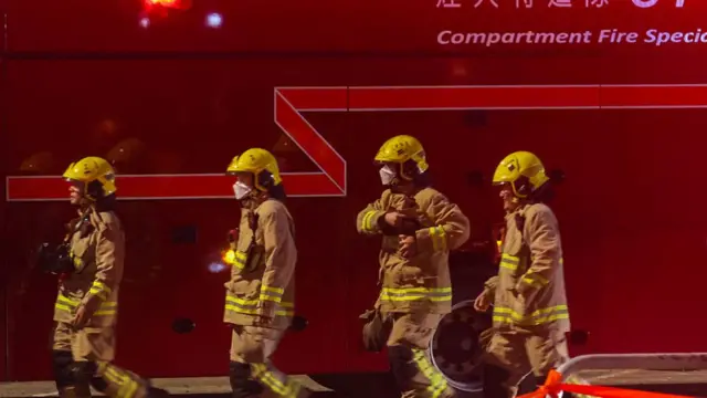 Fighters are deployed to the scene as rescue efforts continue at the Wang Fuk Court residential buildings, in Tai Po, Hong Kong, on 27 November 2025.