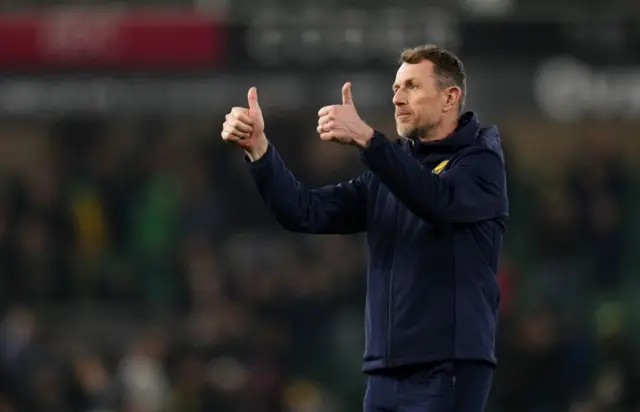 Oxford boss Gary Rowett puts his thumbs up to the travelling fans after the 1-1 draw at Norwich
