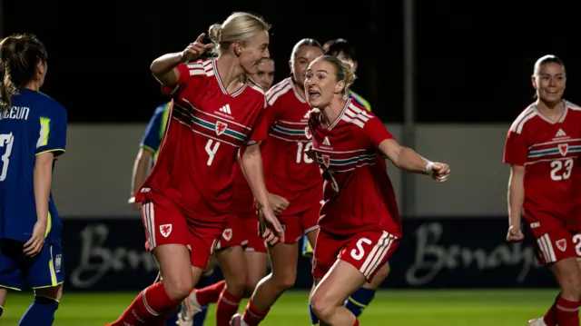 Wales players celebrate Sophie Ingle's opener