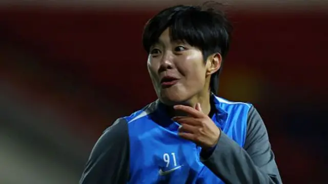 Ji So-yun during warm-up for Birmingham